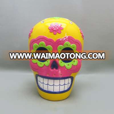 Yellow skull heads piggy bank coin bank